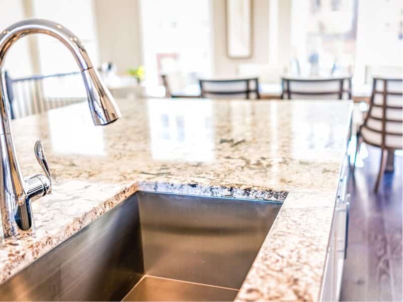 Clean kitchen counter with a deep basin sink